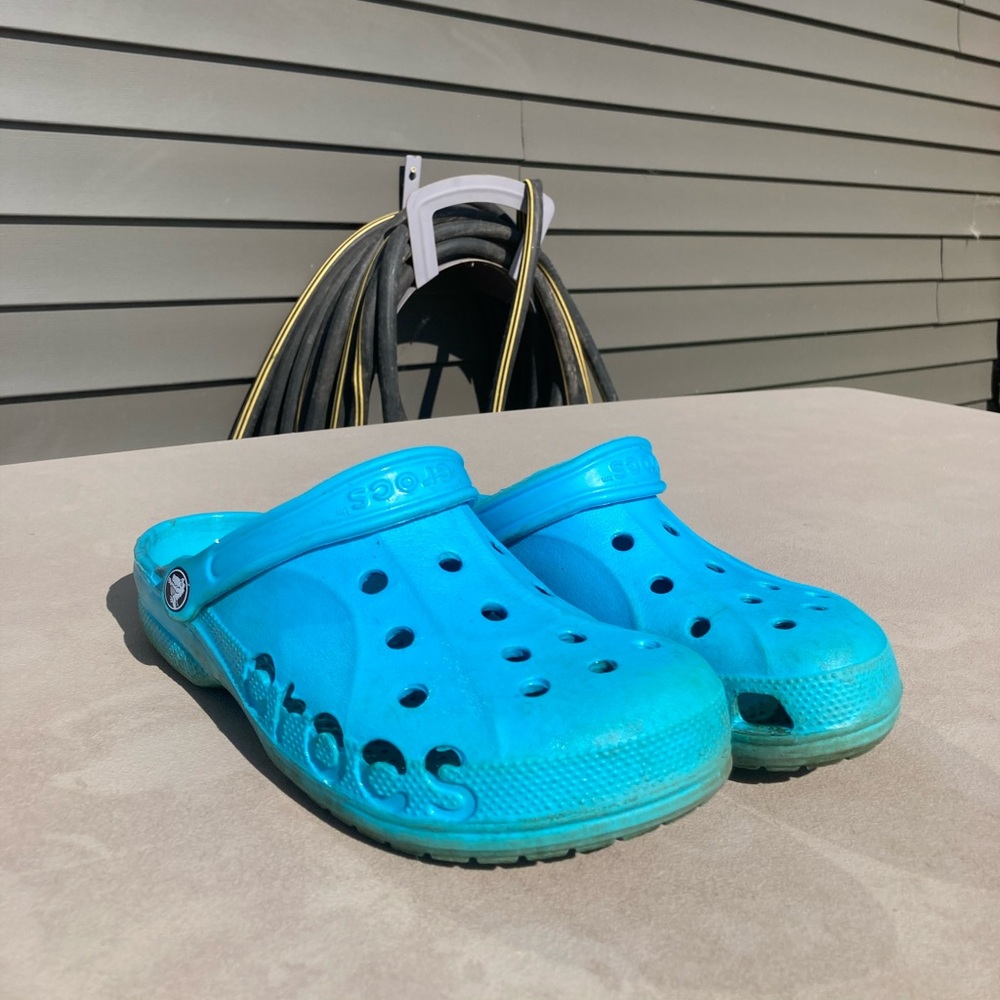 Teal crocs size 10